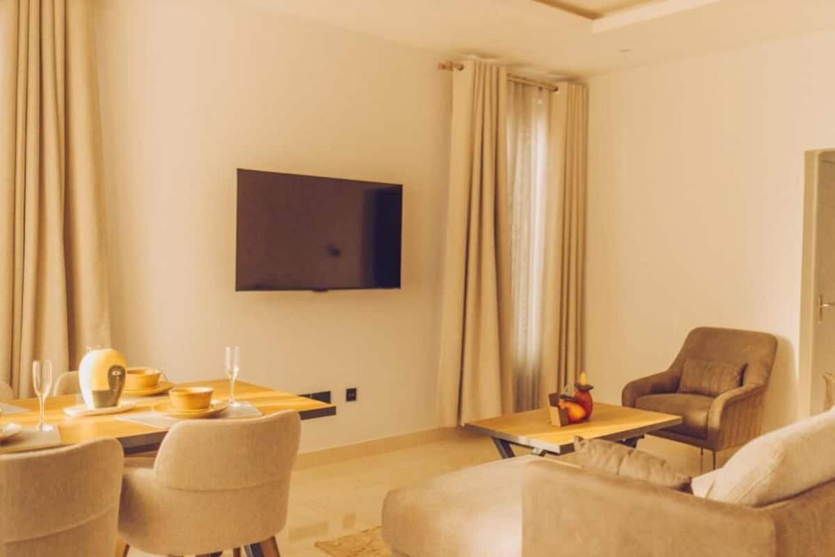 Departamento Deluxe, 1 habitación | Área de sala de estar