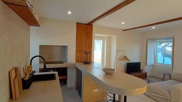Deluxe Studio, Ocean View | Private kitchen | Fridge, stovetop, cookware/dishes/utensils