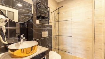 Standard Triple Room, Balcony | Bathroom | Shower, hair dryer, towels, soap