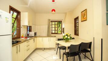 Family Apartment, Balcony, Garden View | Private kitchen | Highchair