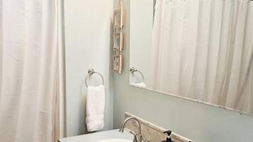 Shower, hair dryer, shampoo