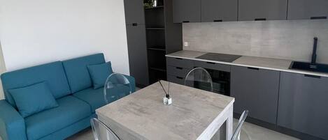Appartement Confort, vue partielle sur la mer | Intérieur