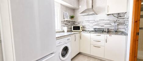 Fridge, microwave, coffee/tea maker, toaster