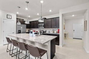 Fridge, microwave, oven, stovetop - Perfect Vacation home in a Brand New Resort 1283 (Clermont)