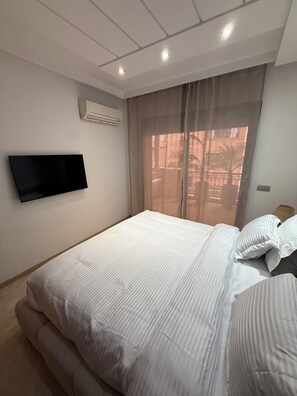1 bedroom, iron/ironing board, Internet, bed sheets - Cosy apartment for 4 people in secure residence with swimming pool (Marrakech)