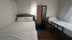 Family Quadruple Room, City View | Desk, iron/ironing board, free WiFi