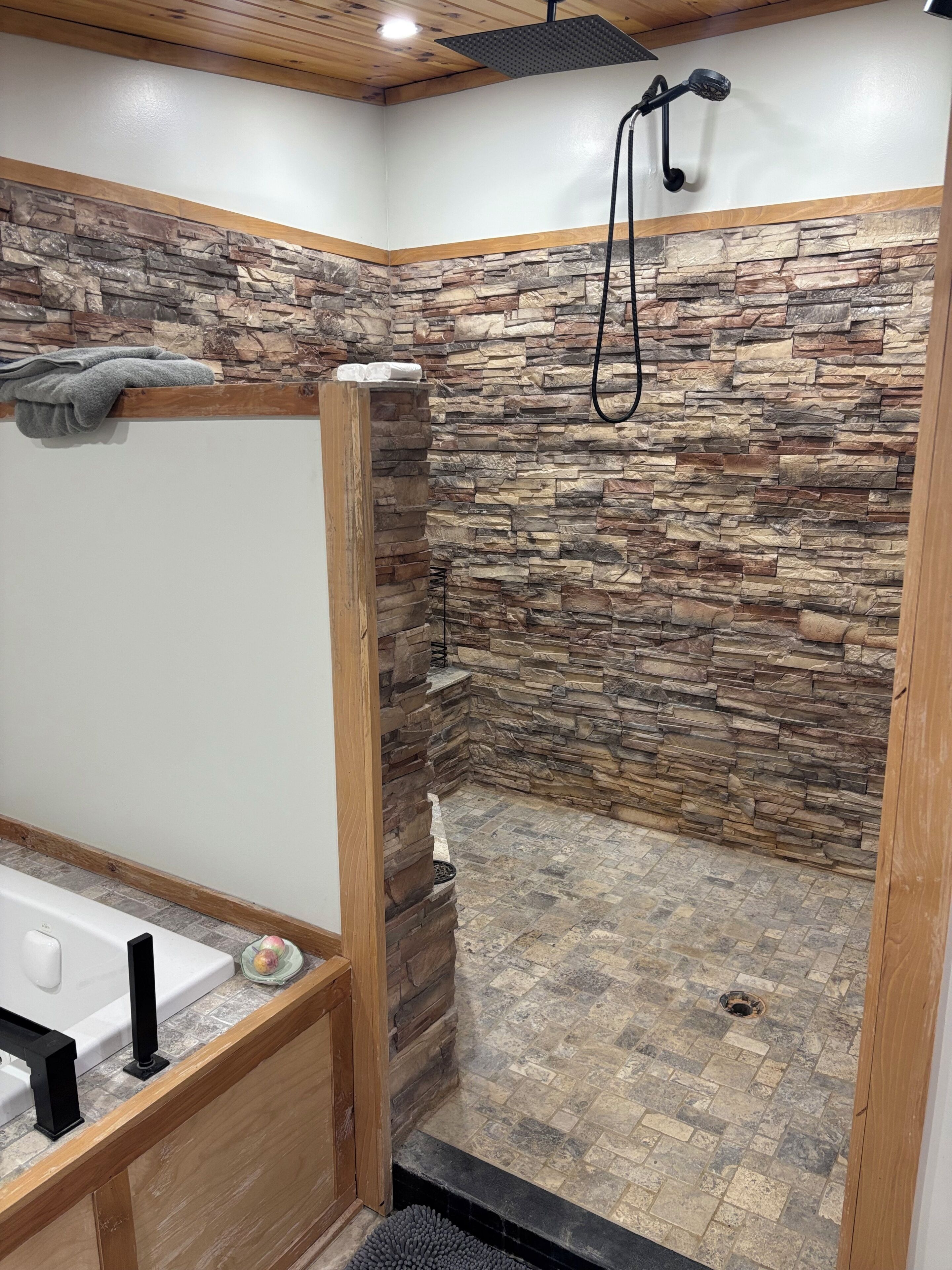 Jetted tub, hair dryer, towels, soap