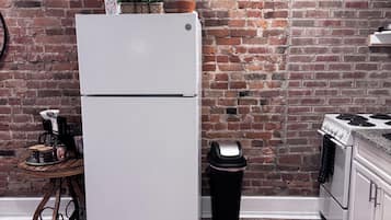 Espresso maker, coffee/tea maker, full-size fridge, microwave