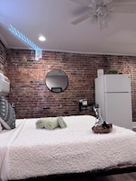Premium bedding, memory-foam beds, in-room safe, laptop workspace