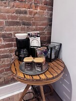 Espresso maker, coffee/tea maker, full-sized fridge, microwave