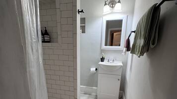 Shower, eco-friendly toiletries, hair dryer, towels