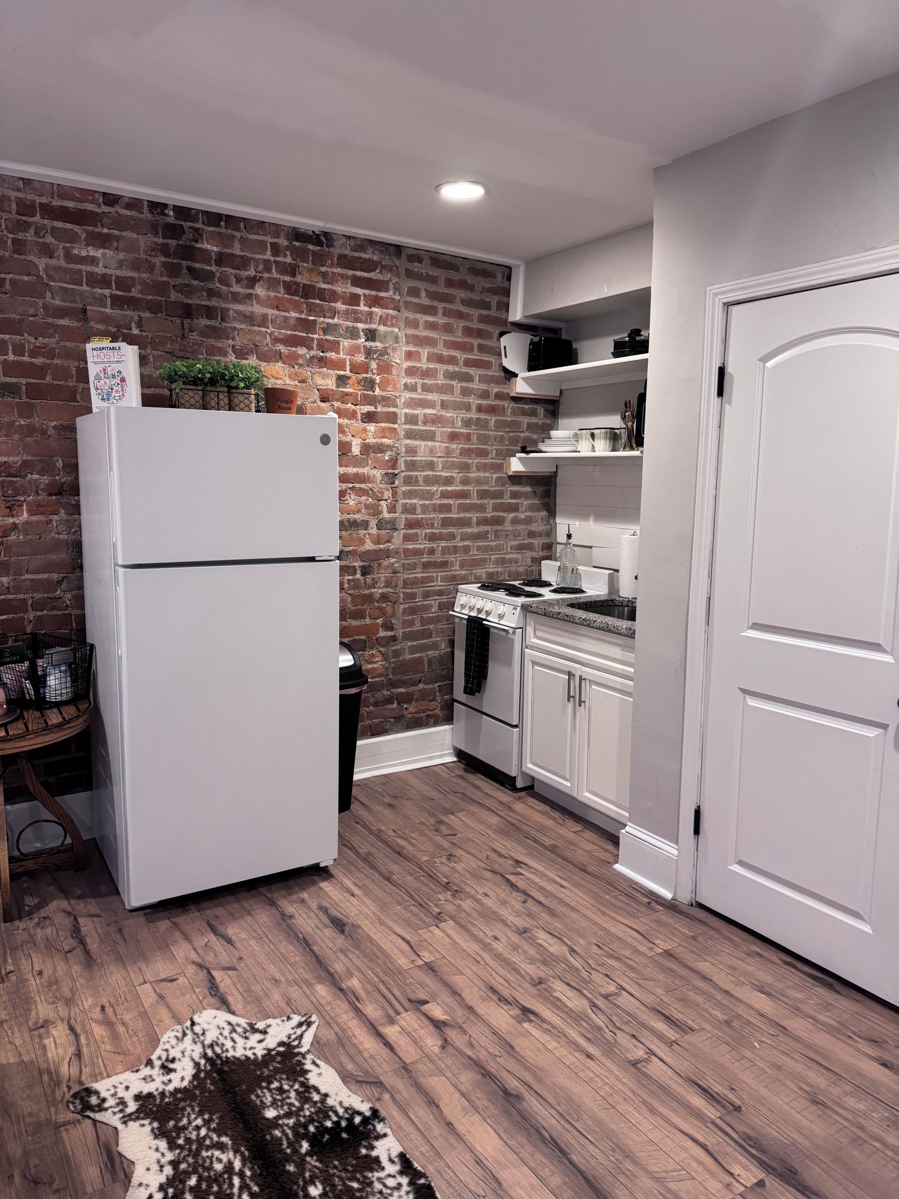 Espresso maker, coffee/tea maker, full-sized fridge, microwave