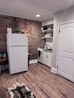 Espresso maker, coffee/tea maker, full-sized fridge, microwave