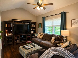 TV, fireplace - World Cup Retreat | Pool • Sleeps 8 • KC (Kansas City)