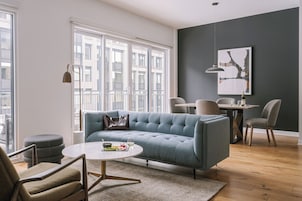 Deluxe Apartment, 3 Bedrooms, Terrace | Living area | 42-inch flat-screen TV with digital channels