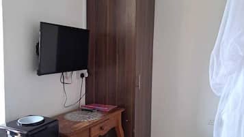 Deluxe Studio Suite | Living area | 24-inch Smart TV with digital channels