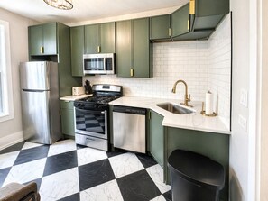 Fridge, microwave, oven, stovetop - Gothic-meets-mid-century 2BR in Lakeview | Statment Kitchen + Dining for 4 (Chicago)