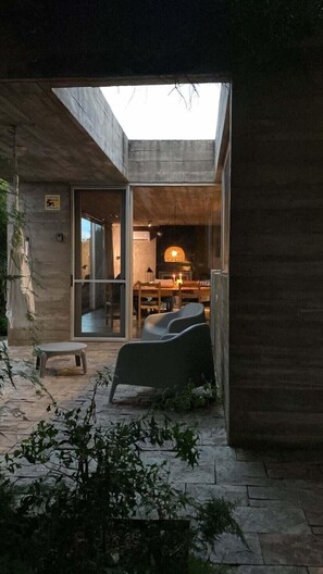 Outdoor dining - CASA LOBO- La Pedrera A contemporary refuge between the forest and the sea. (Tajamares de la Pedrera)