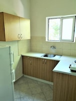 Frigorífico y placa de cocina