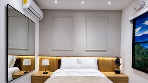Kamar Single Deluks | Seprai premium, selimut bulu angsa, brankas, dan meja kerja