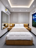 Premium bedding, down duvets, in-room safe, desk