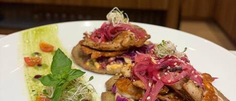 A plate of food with various toppings and garnishes.