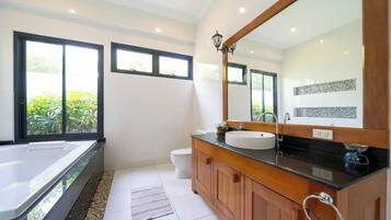 Shower, jetted tub, hair dryer, bidet