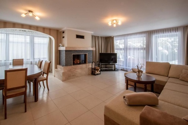 Deluxe Apartment, Garden View | Living area | 32-inch LED TV with cable channels