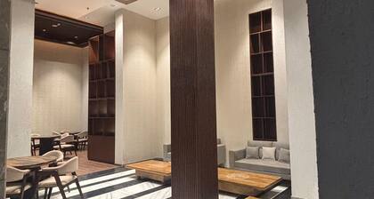 Cozy 2-bedroom apartment with AC in serene Noida