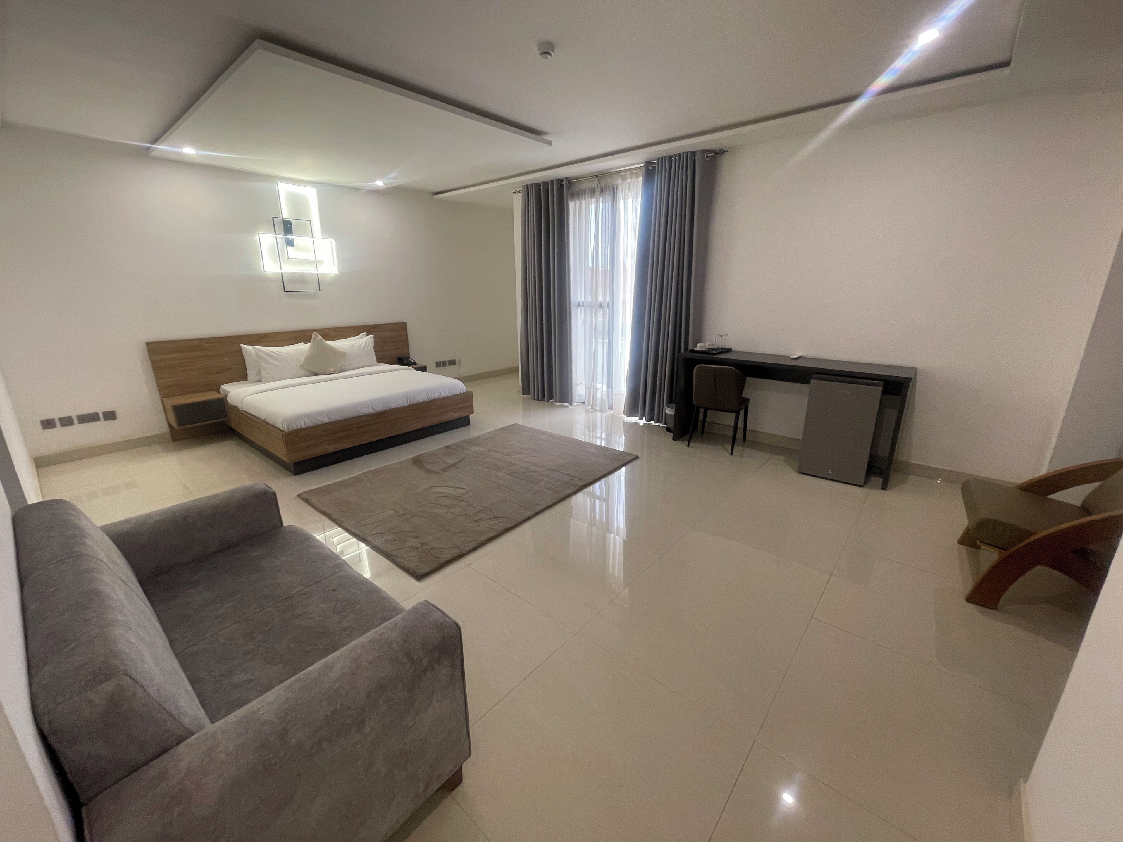 Executive Room, Balcony | Desk, laptop workspace, blackout curtains, iron/ironing board