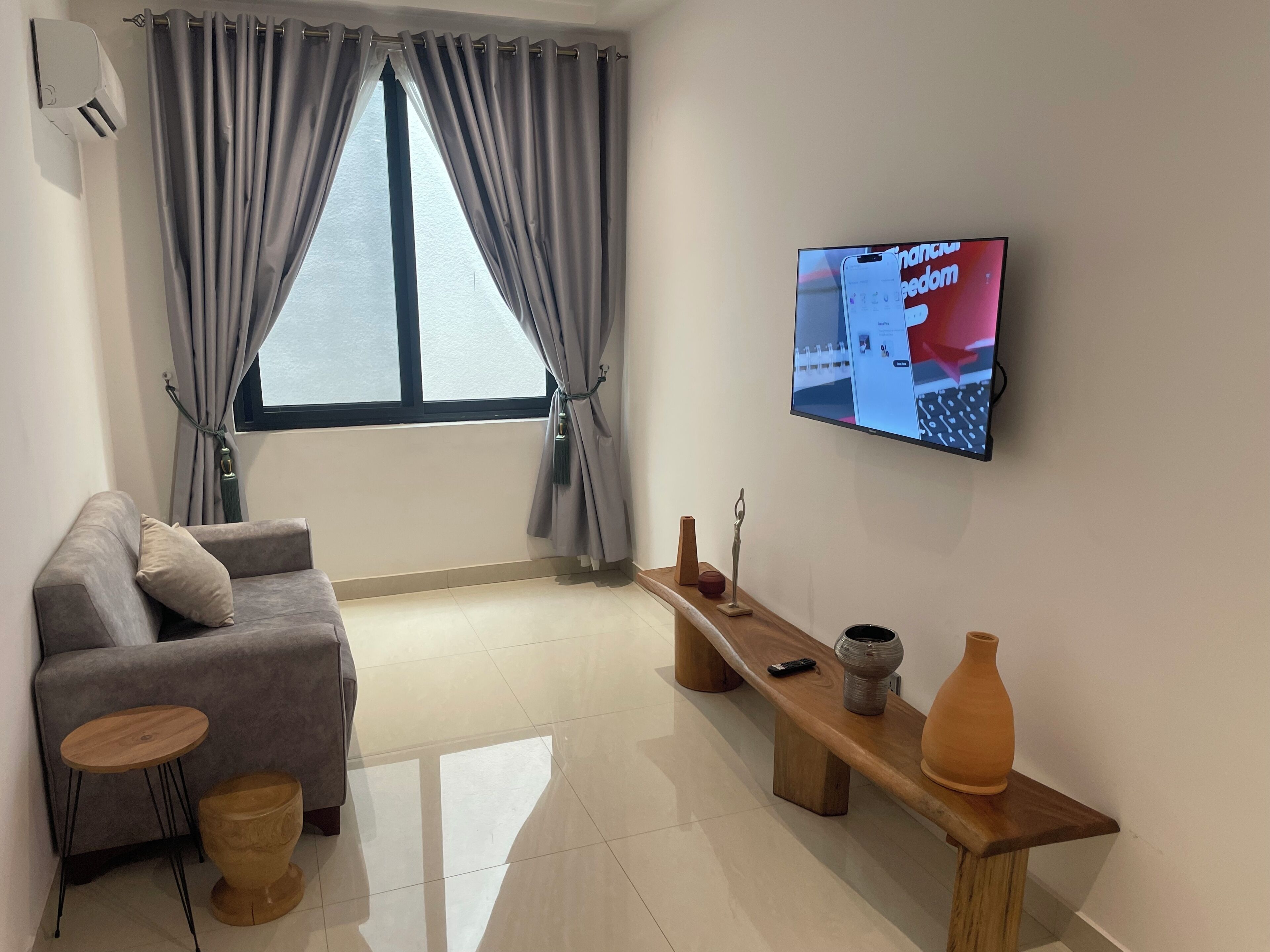 Superior Suite | Living area | 42-inch Smart TV with satellite channels
