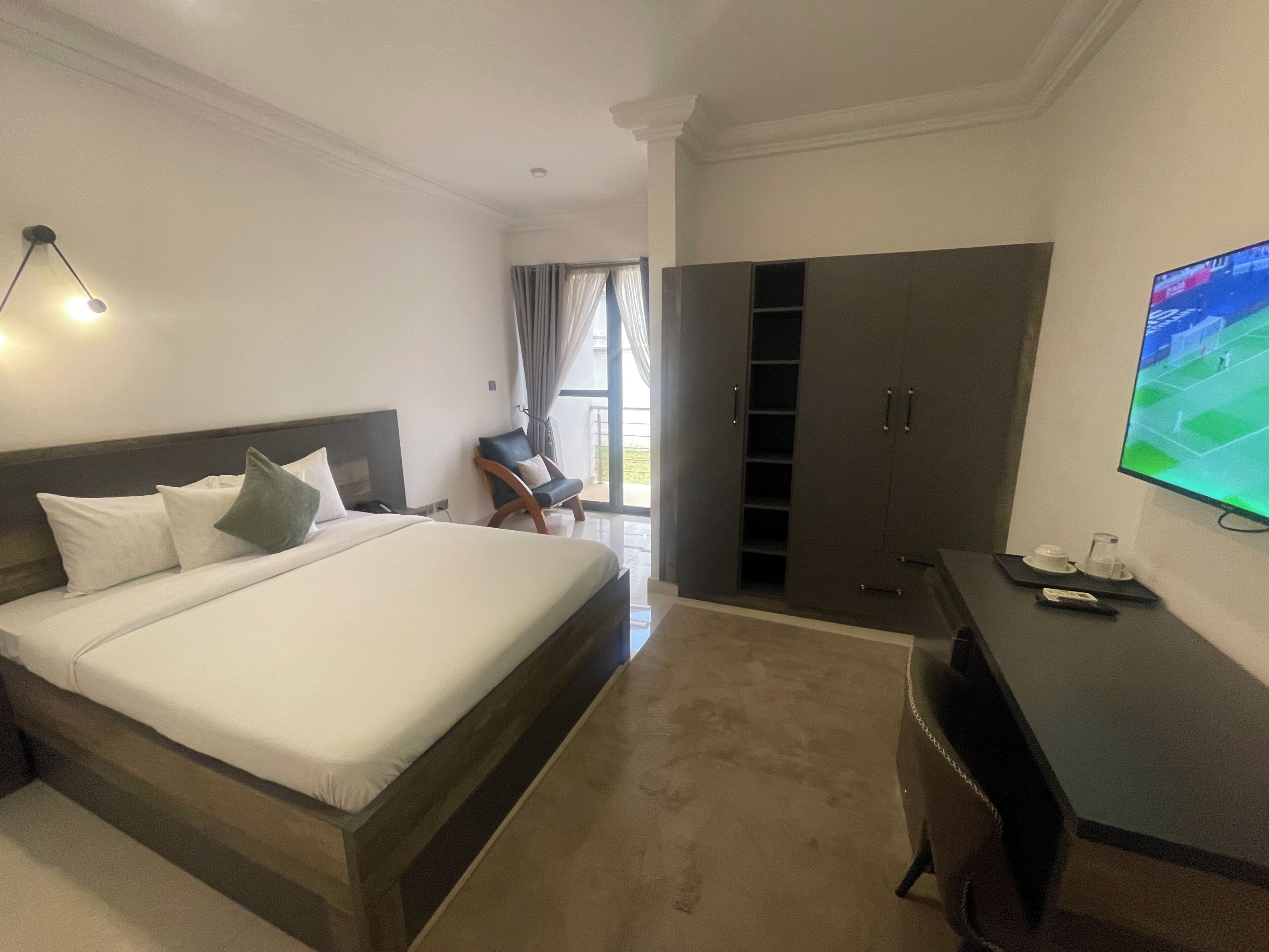 Desk, laptop workspace, blackout curtains, iron/ironing board