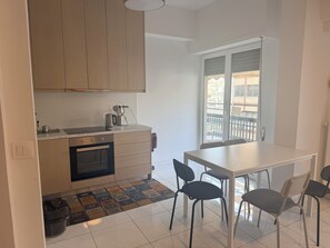 Private kitchen - Delightful 2-bedroom apartment near the port (Pireas)