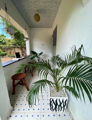 Casa Deluxe, vistas al jardín | Balcón