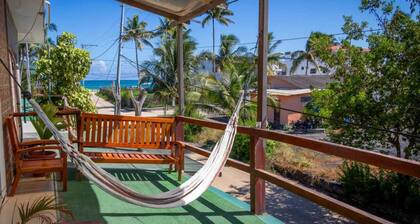 Stay in front of flamingos, meters from the beach in Isabela Galapagos.