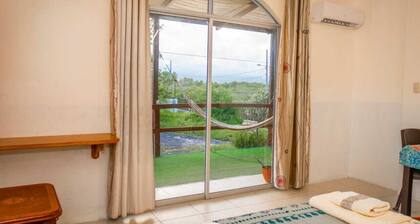 Stay in front of flamingos, meters from the beach in Isabela Galapagos.