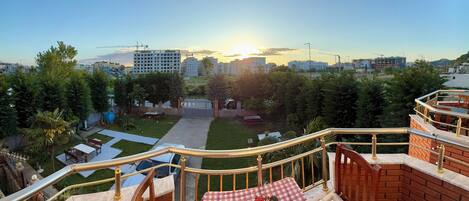 Comfort Triple Room, Balcony, Garden View | Outdoor dining