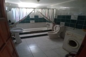Hair dryer, bidet, towels, soap