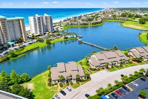A coastal resort with a marina, beachfront, and high-rise buildings. - Seascape Boardwalk Villa 175 (Miramar Beach)