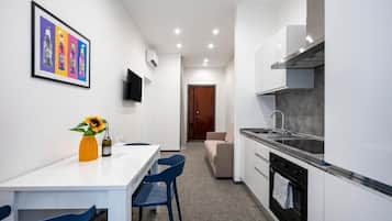 Apartemen Deluks, balkon, pemandangan kota | Dapur pribadi