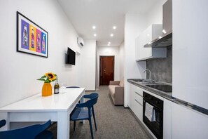 Apartamento luxo, sacada, vista para a cidade | Cozinha privada