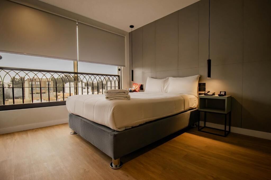 Desk, laptop workspace, free WiFi, bed sheets