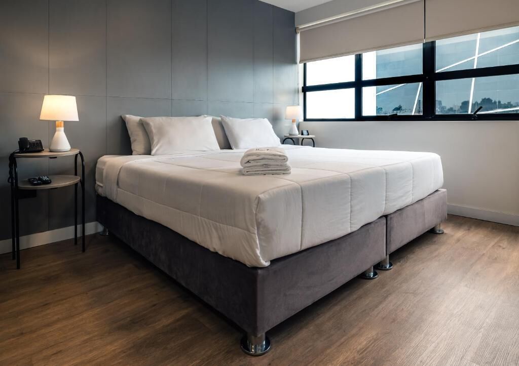 Desk, laptop workspace, free WiFi, bed sheets