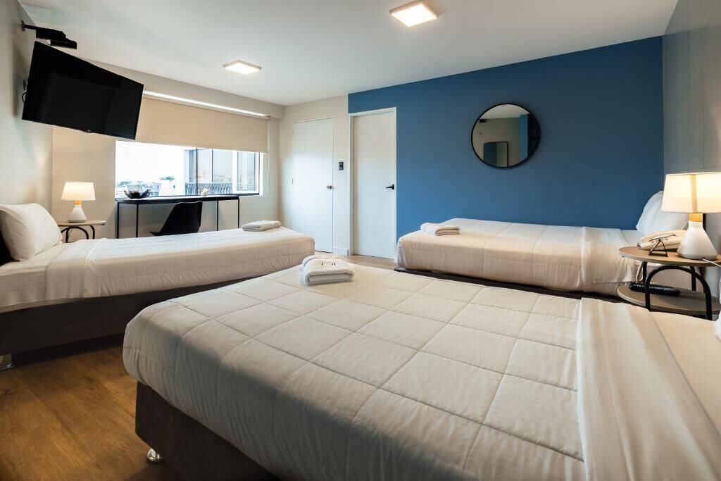 Desk, laptop workspace, free WiFi, bed sheets