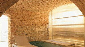 A room with a brick ceiling, a green pool table, and a white lounge chair. - Renovated commandery on the Elbe with sauna (Werben)