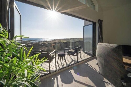 Modern holiday home with sea view in Borhaug