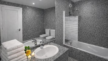 Hair dryer, towels, soap, toilet paper