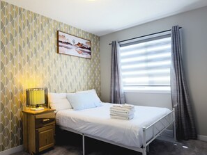 2 quartos, Wi-Fi de cortesia, roupa de cama