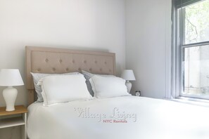 1 habitación, tabla de planchar con plancha, wifi y ropa de cama 