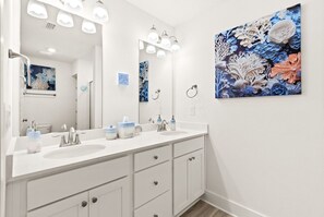 Hair dryer, towels, soap, shampoo